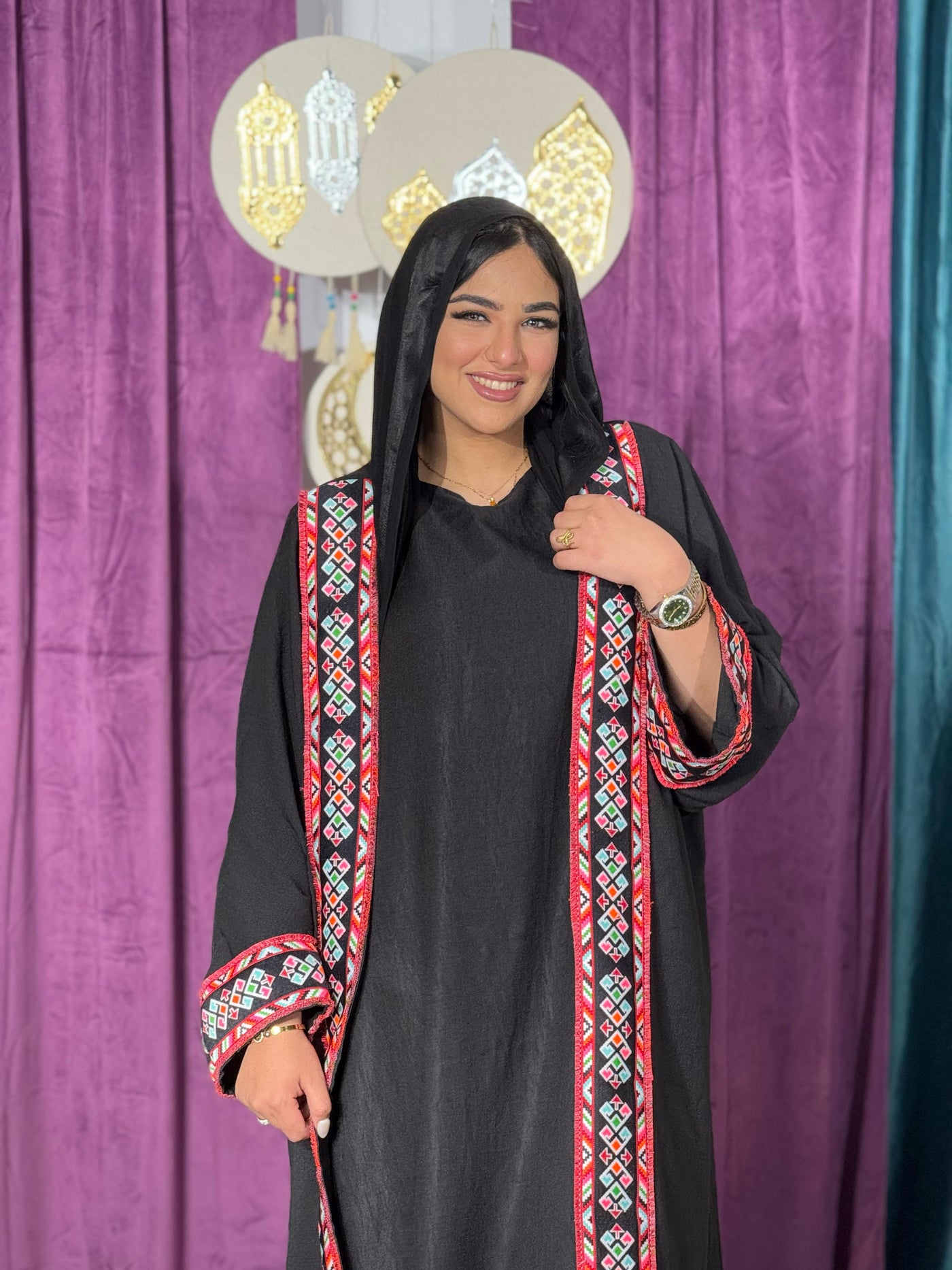 Black kaftan with red embroidered trim