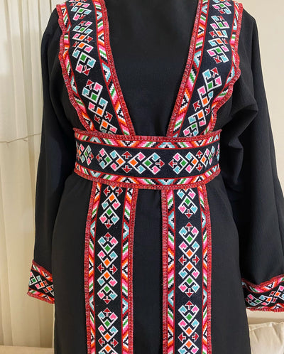 Black kaftan with red embroidered trim